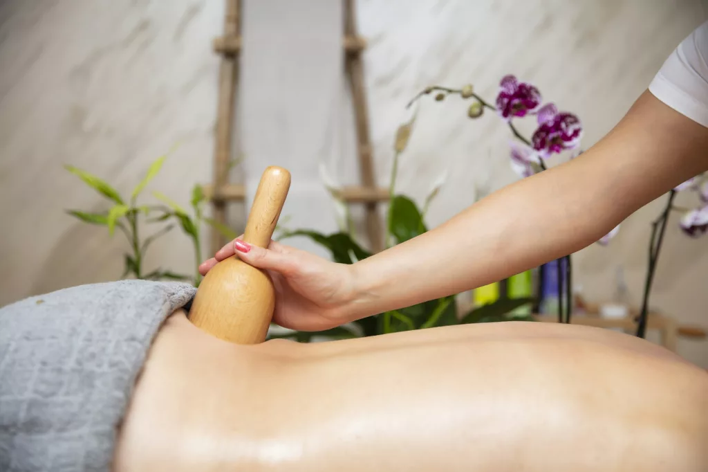 Maderotherapy massage with wooden swedish cup