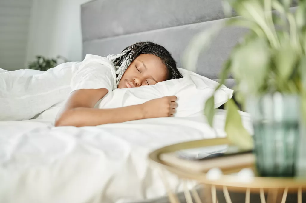 Young Woman Sleeping in Morning